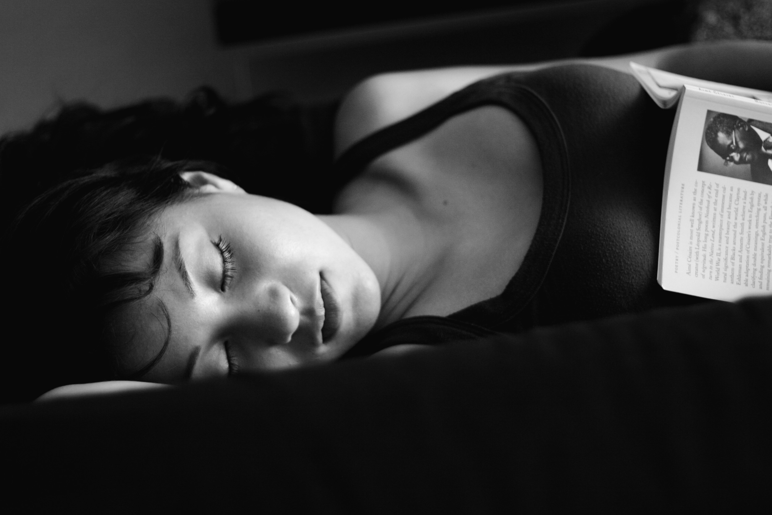 Jackie_Martinez_in_BW_sleeping_with_a_book
